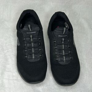 Skechers black slip on walking sneaker shoes